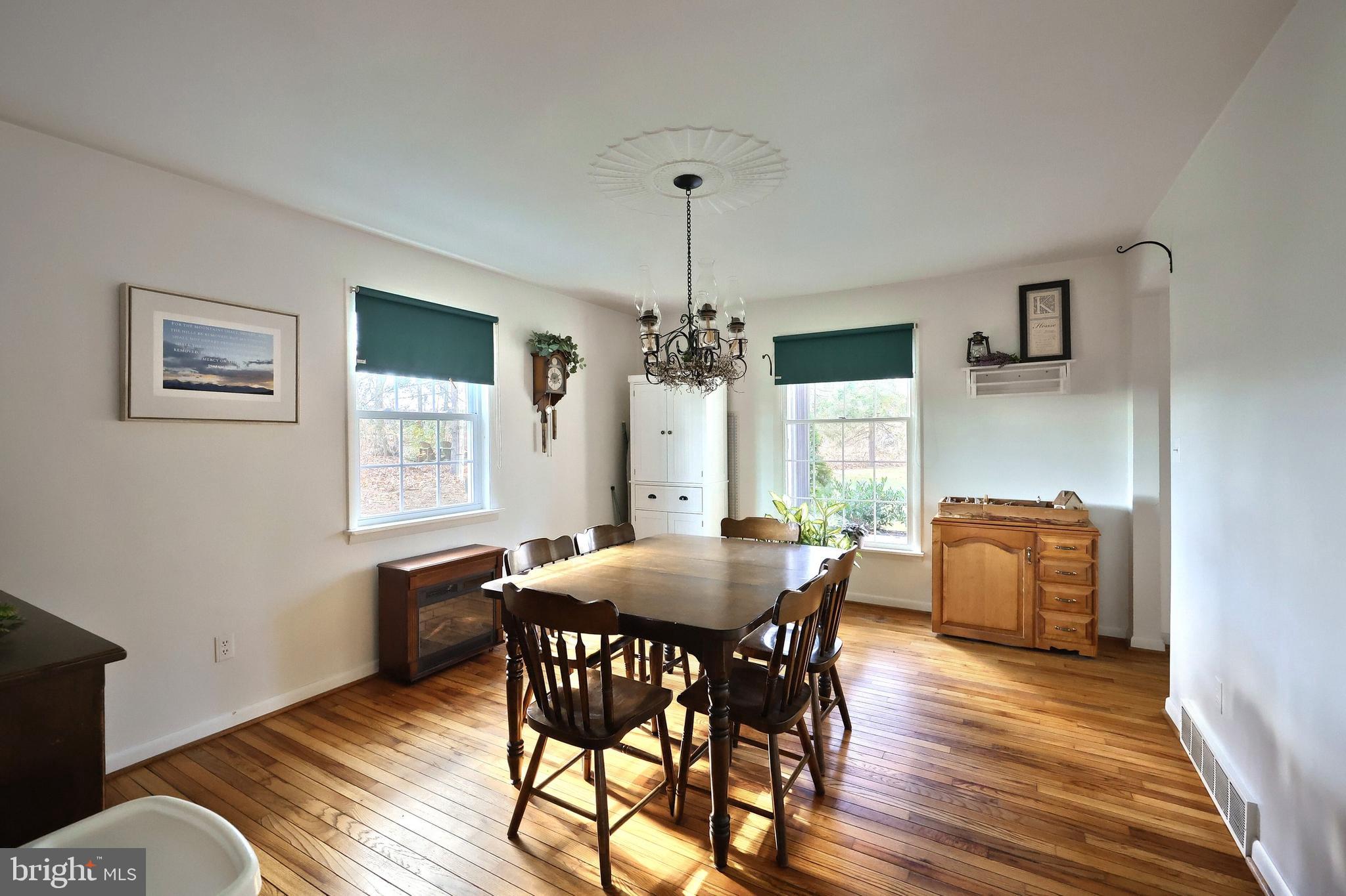 798 Goram Road Brogue, PA 17309 - Photo 30 of 57 a dining room with furniture window and wooden floor