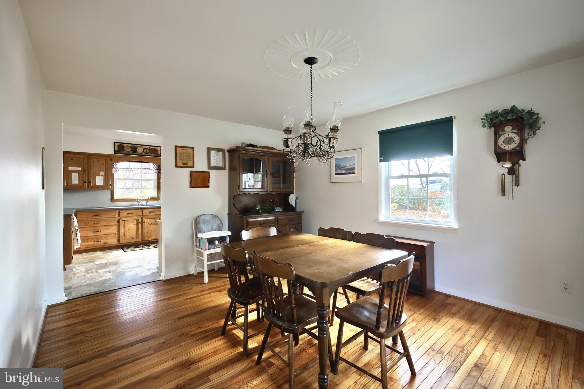 798 Goram Road Brogue, PA 17309 - Photo 31 of 57 a view of a dining room with furniture window and wooden floor