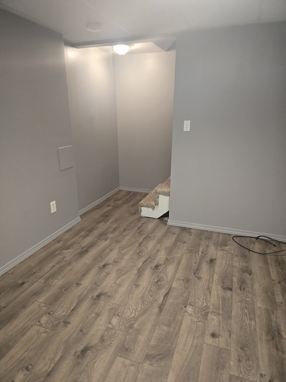 89 Belanger Street, Unit 89 Three Rivers, MA 01080 - Photo 14 of 19 a view of a room with wooden floor