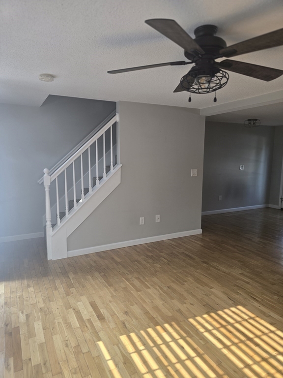 89 Belanger Street, Unit 89 Three Rivers, MA 01080 - Photo 3 of 19 a view of an empty room with a chandelier fan