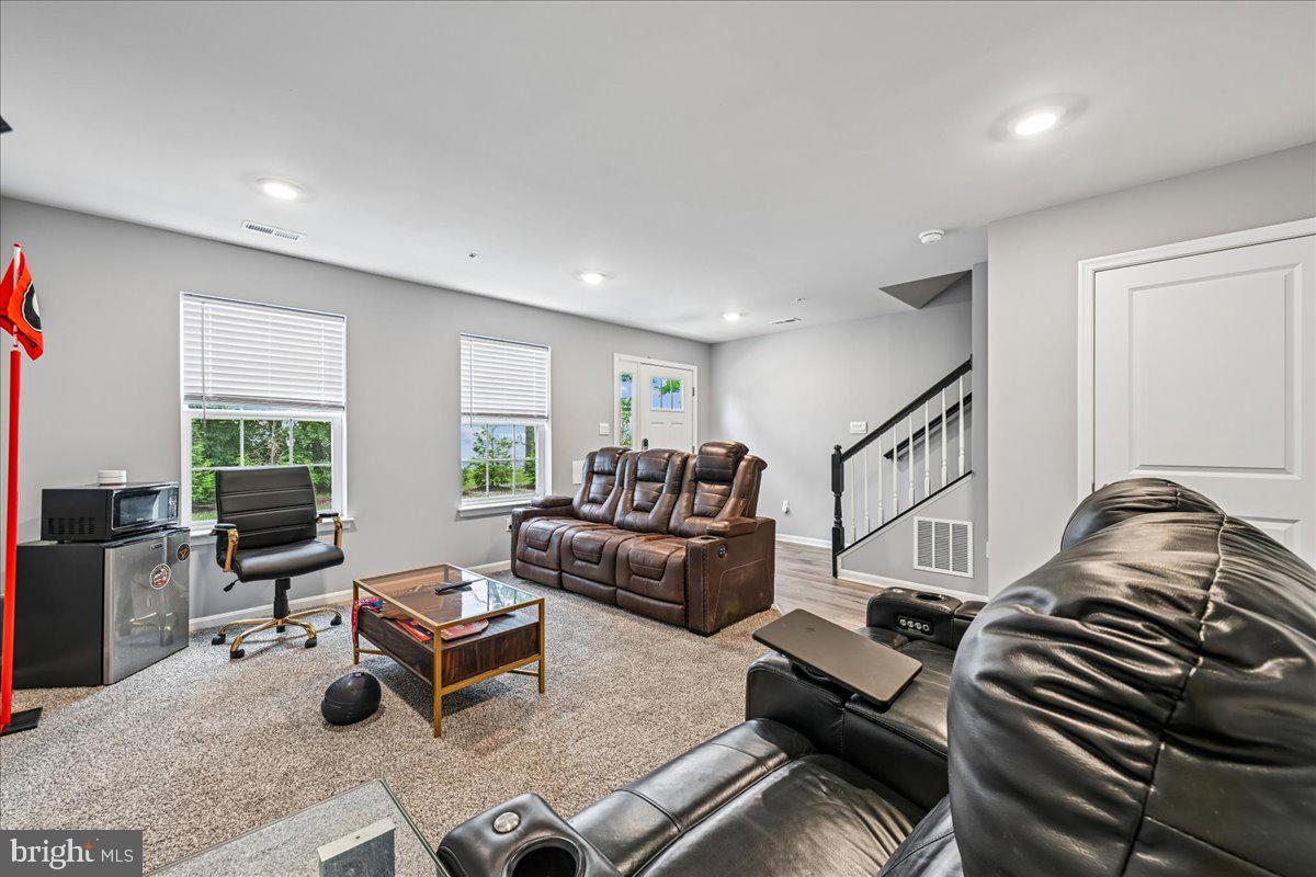 6619 Darter Way Clinton, MD 20735 - Photo 5 of 20 Living Room with Stair Access