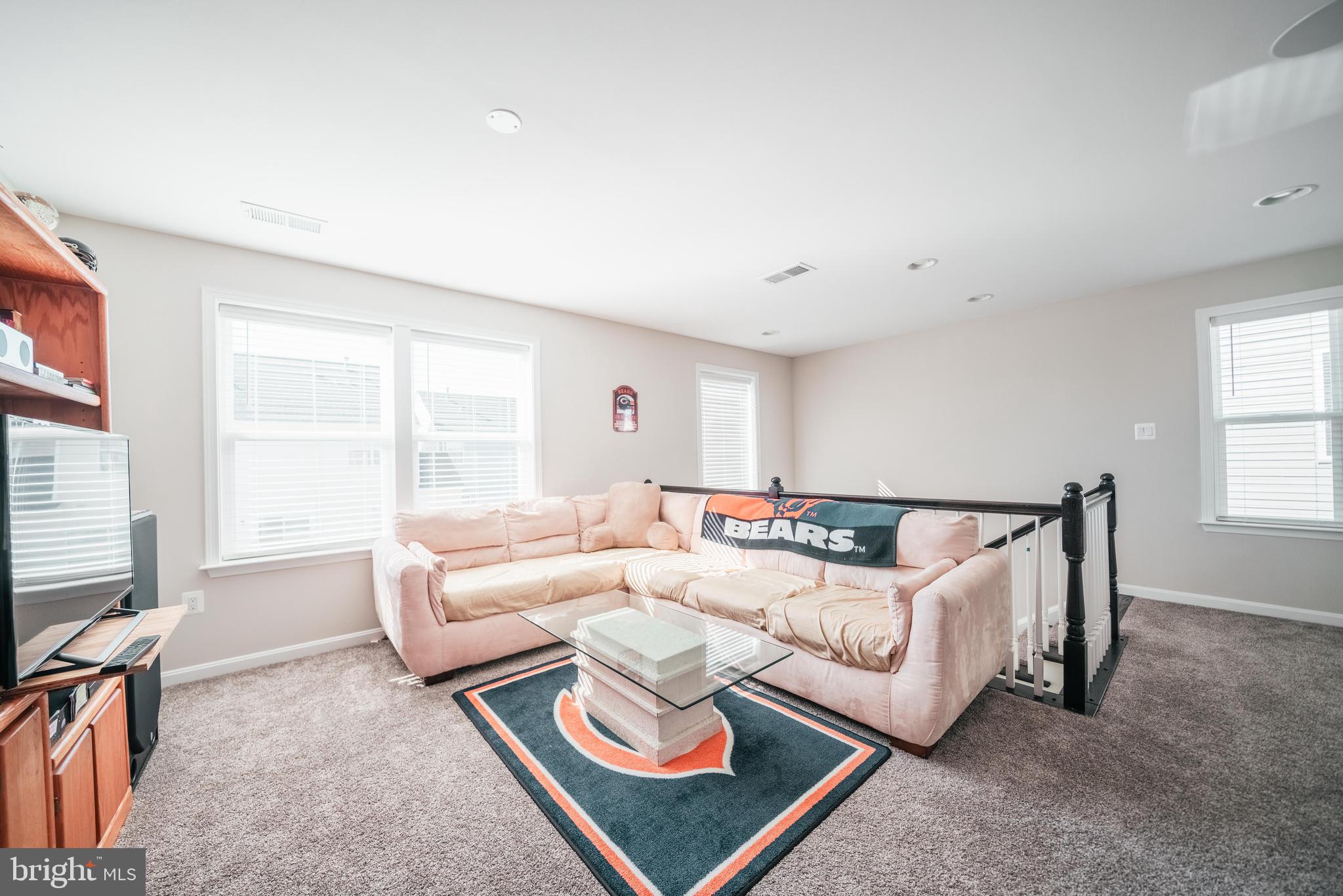 2175 Juniper Drive Culpeper, VA 22701 - Photo 21 of 34 a living room with furniture and a flat screen tv