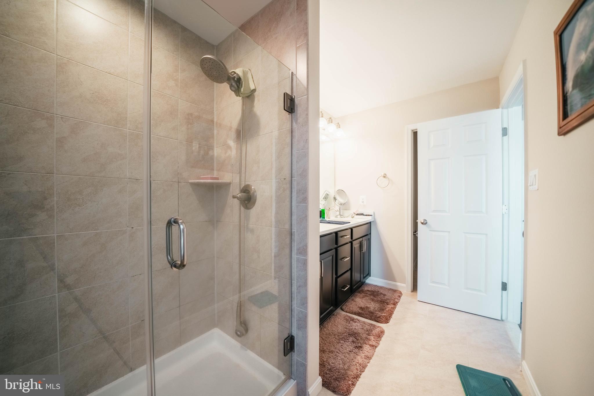 2175 Juniper Drive Culpeper, VA 22701 - Photo 24 of 34 a bathroom with a tub and a shower