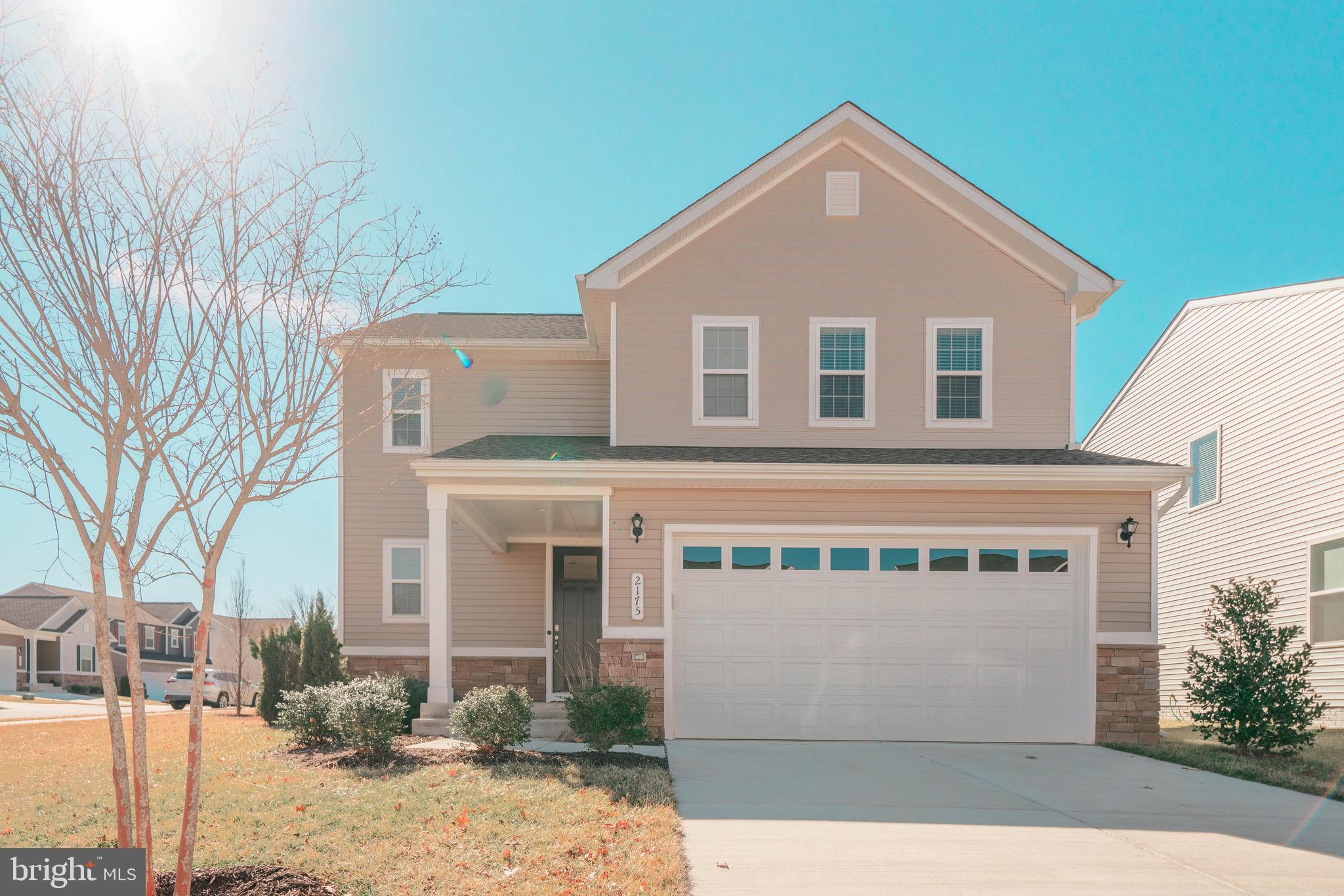 2175 Juniper Drive Culpeper, VA 22701 - Photo 29 of 34 a front view of a house with a yard