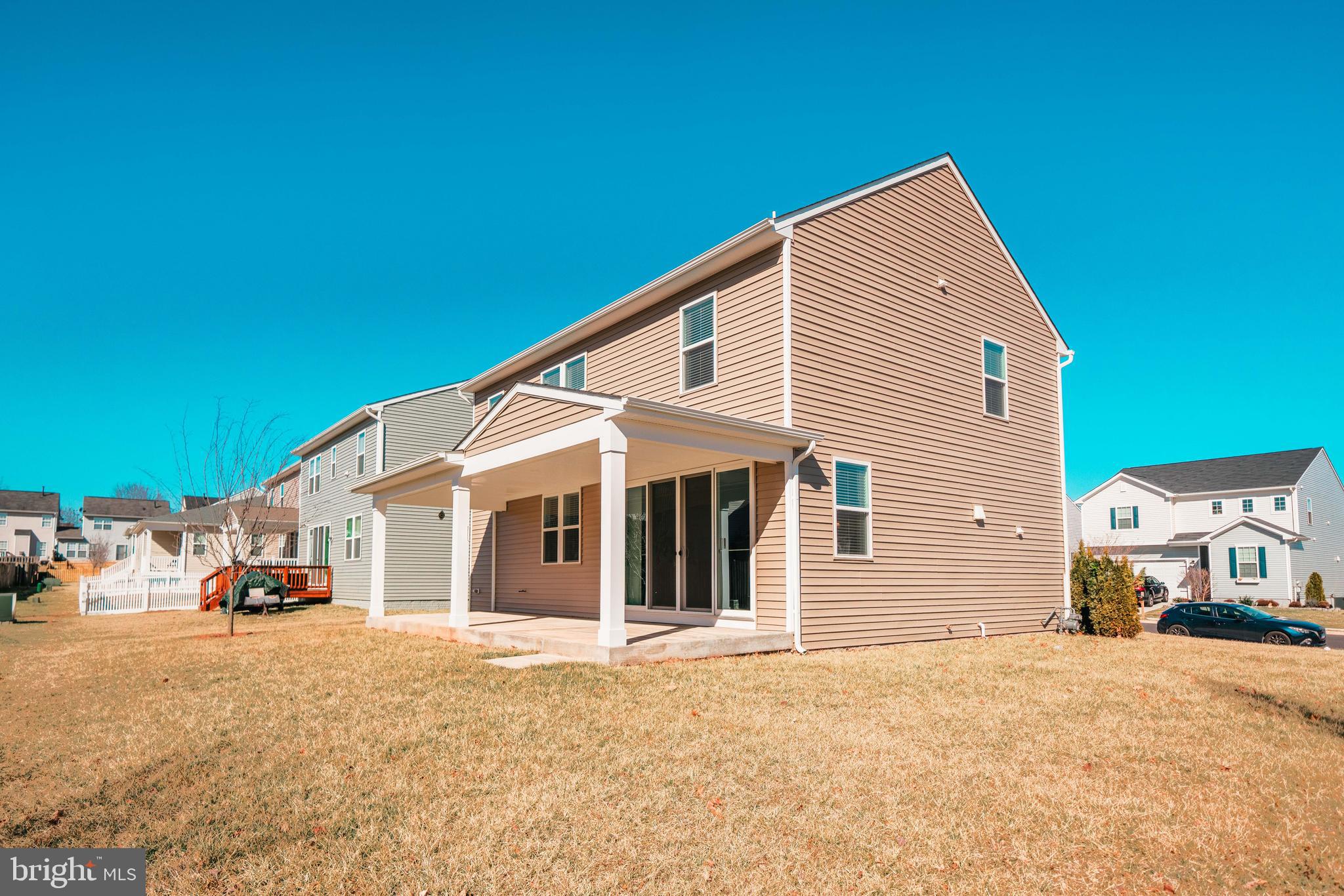 2175 Juniper Drive Culpeper, VA 22701 - Photo 30 of 34 a view of a white house with a outdoor space