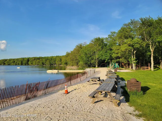 a view of a lake with a patio