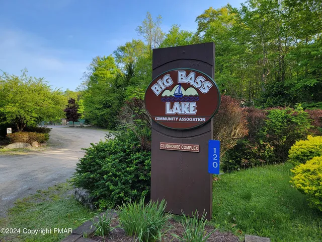 a sign that is on the side of a road