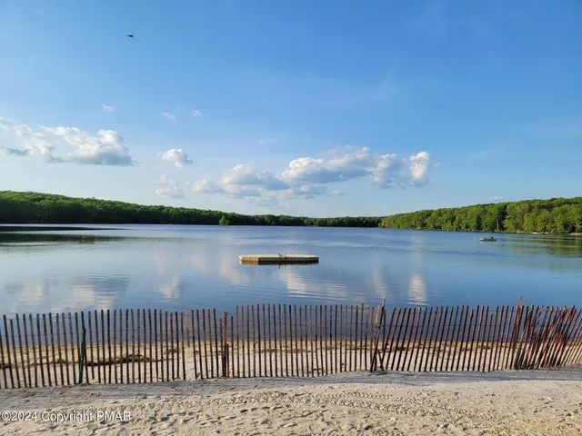 a view of a lake from a balcony