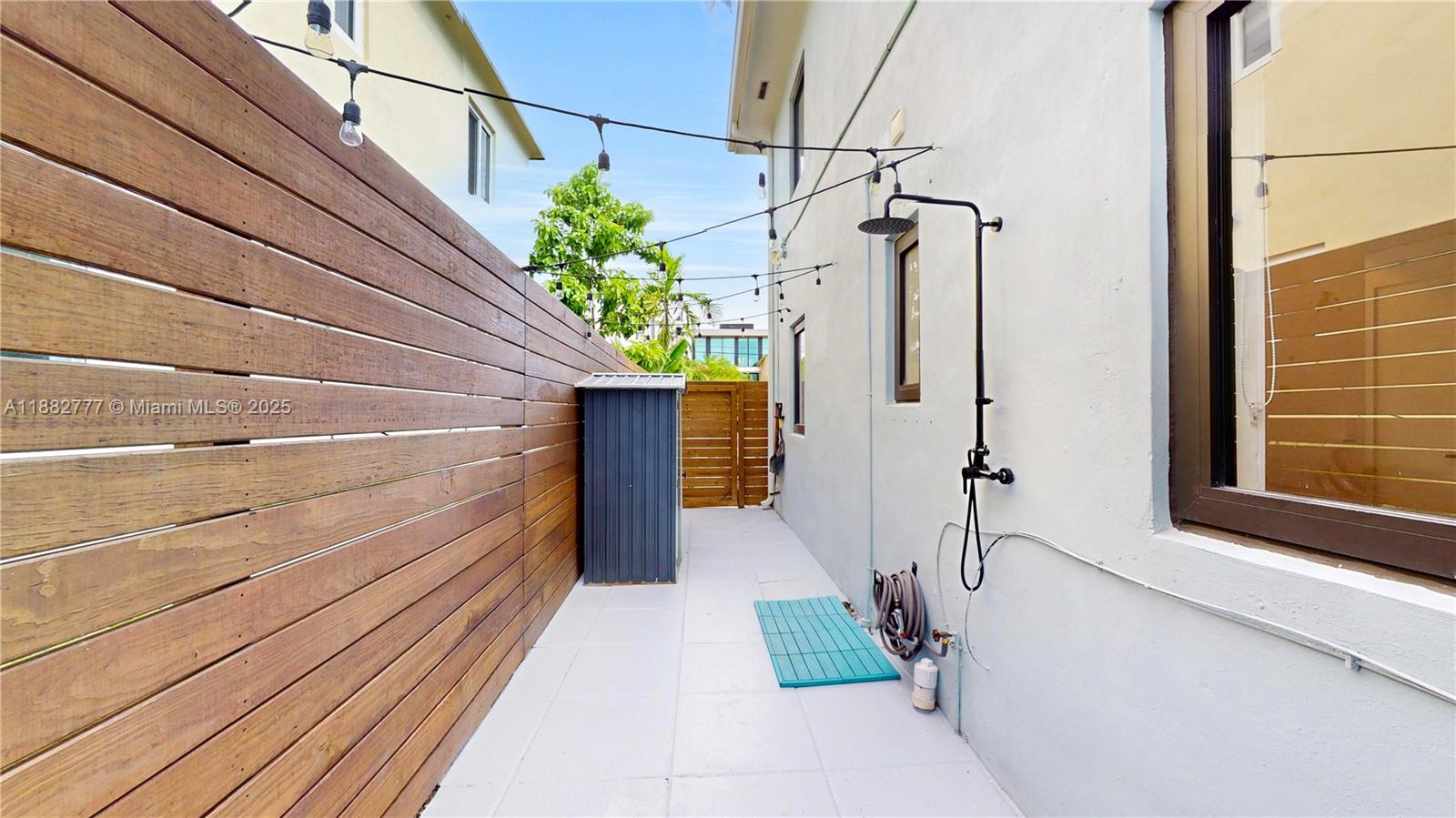 702 86th Street Miami Beach, FL 33141 - Photo 22 of 25 a view of a house with a street