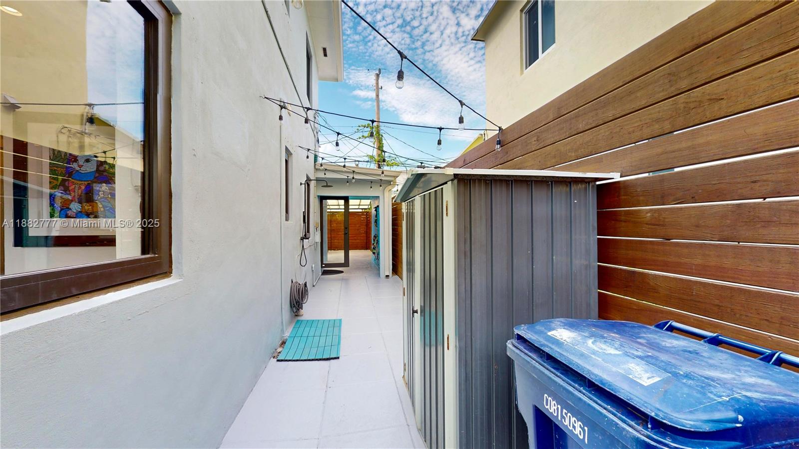 702 86th Street Miami Beach, FL 33141 - Photo 23 of 25 a view of outdoor space and deck