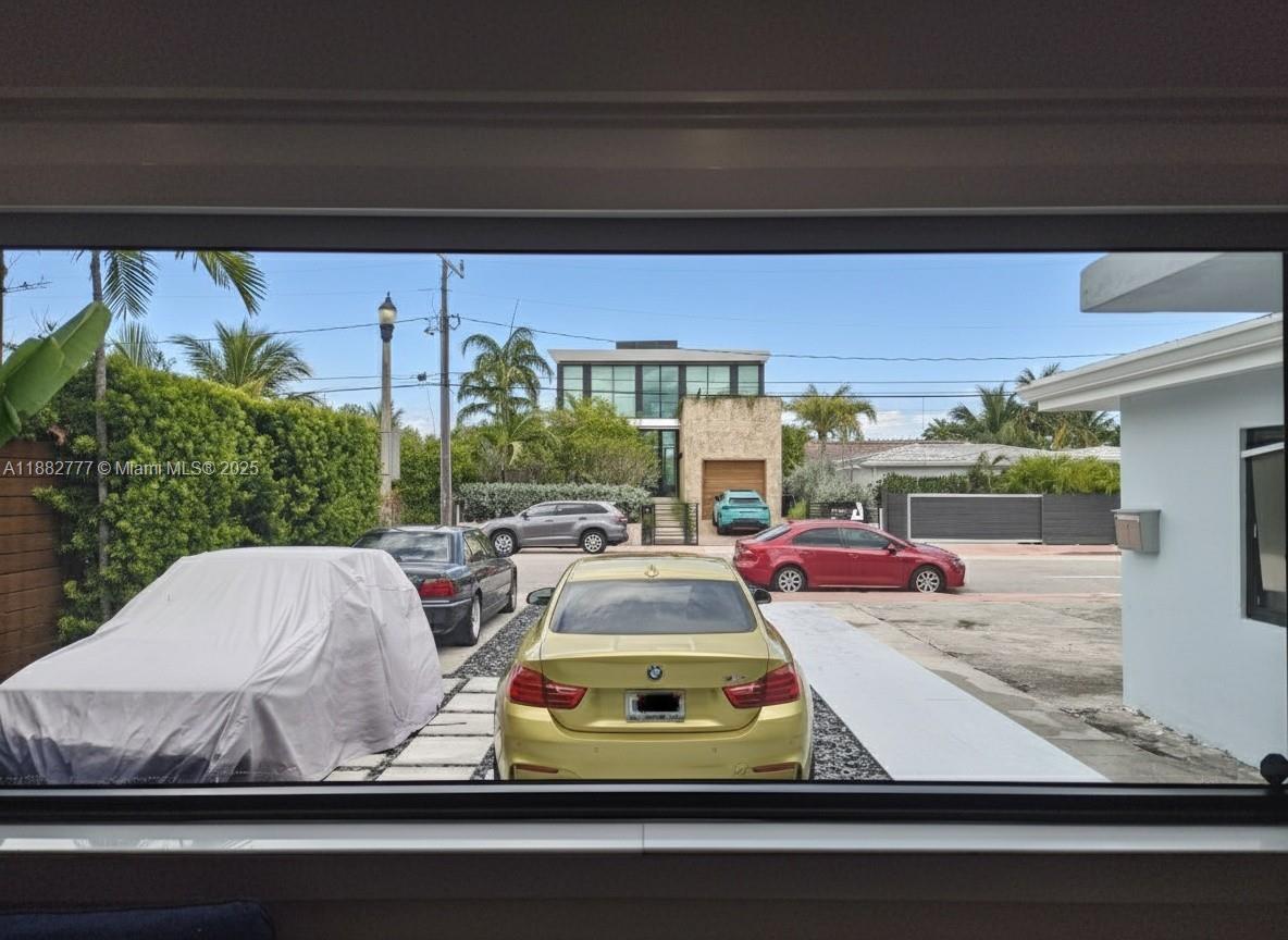 702 86th Street Miami Beach, FL 33141 - Photo 5 of 25 a view of swimming pool with outdoor seating and plants