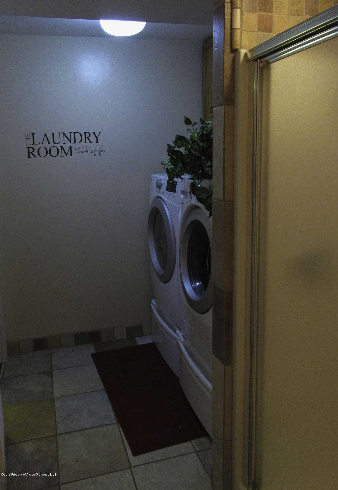 660 Moki Avenue Rifle, CO 81650 - Photo 18 of 25 a utility room with dryer and washer
