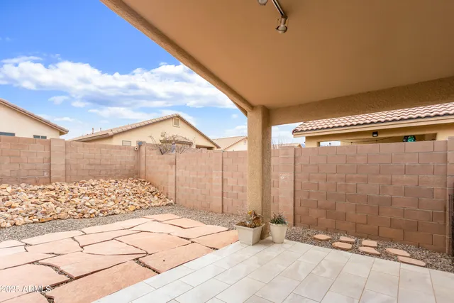 a view of a backyard of a house
