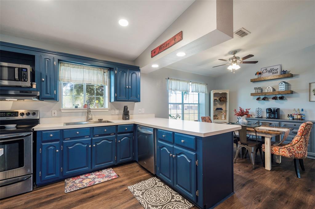 8229 East Lone Oak Road Valley View, TX 76272 - Photo 5 of 22 a kitchen with lots of counter top space