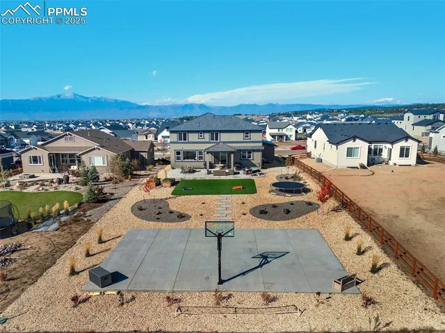 an aerial view of a house with garden space