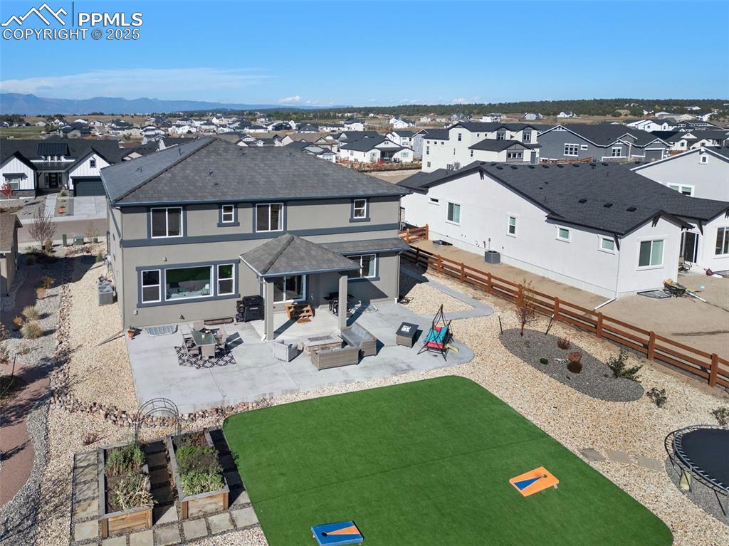 9755 Owl Perch Loop Colorado Springs, CO 80908 - Photo 46 of 50 an aerial view of a house with garden