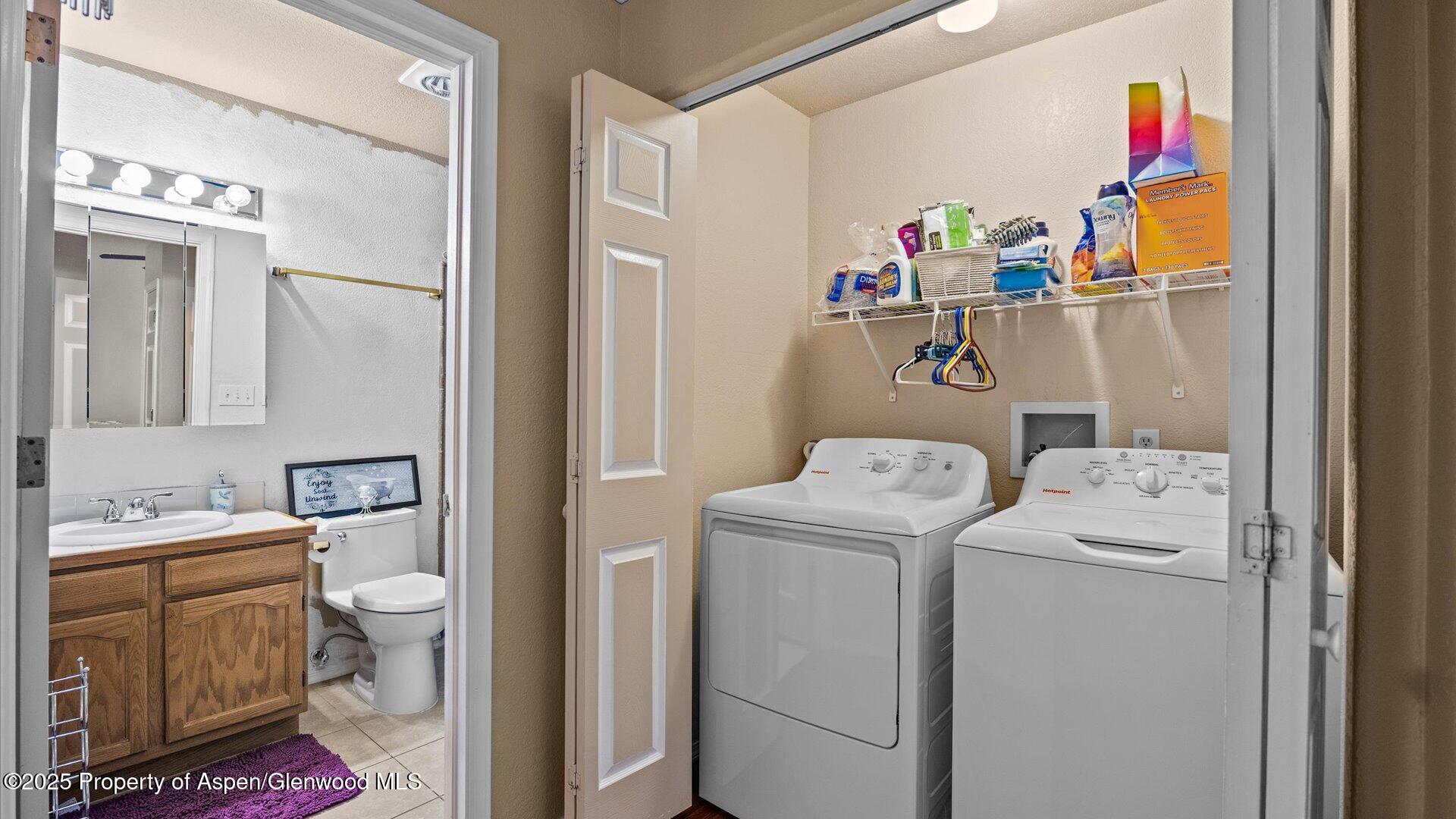 9 West Ridge Court, Unit 1113 Parachute, CO 81635 - Photo 16 of 27 a room with storage and utility