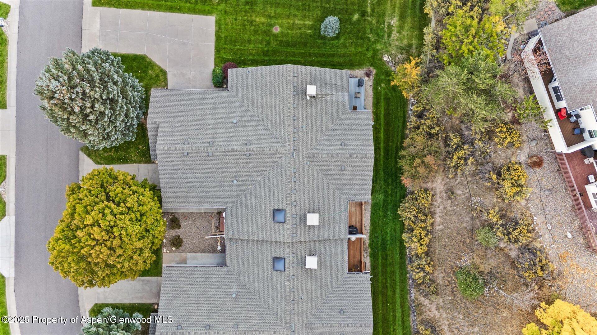 9 West Ridge Court, Unit 1113 Parachute, CO 81635 - Photo 20 of 27 an aerial view of a house with a yard