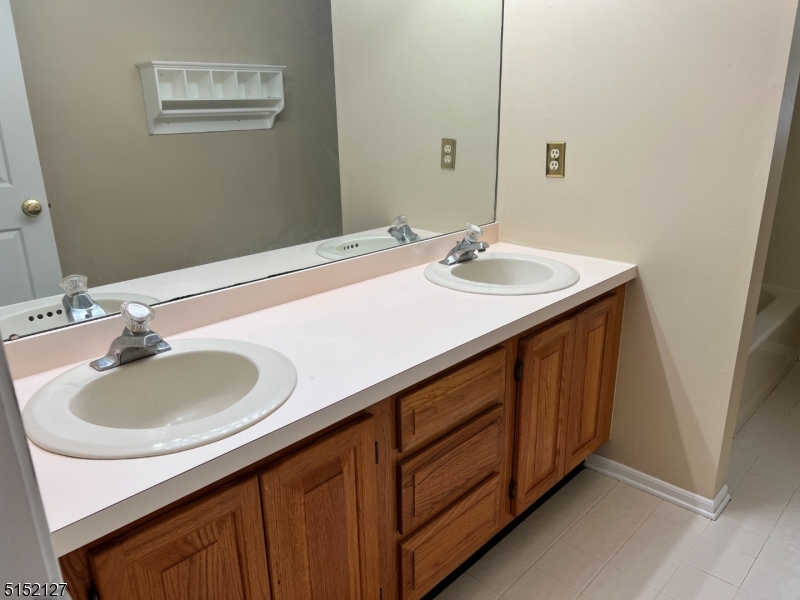 7 Rymon Road Washington, NJ 07882 - Photo 15 of 15 a bathroom with a sink and a mirror