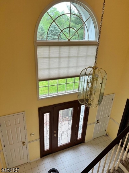 7 Rymon Road Washington, NJ 07882 - Photo 2 of 15 a front view of a house with a wooden door