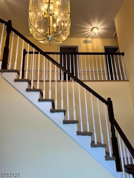 7 Rymon Road Washington, NJ 07882 - Photo 3 of 15 a view of an entryway with staircase