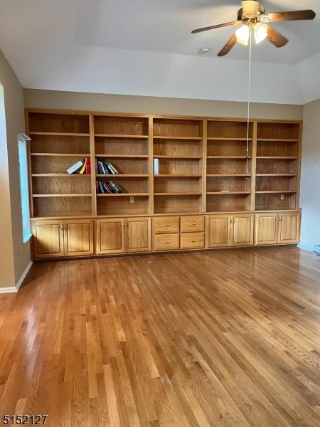 7 Rymon Road Washington, NJ 07882 - Photo 5 of 15 a view of an empty room with a window and wooden floor