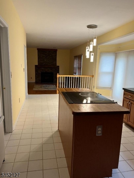 7 Rymon Road Washington, NJ 07882 - Photo 7 of 15 a kitchen with stainless steel appliances granite countertop a sink and a stove