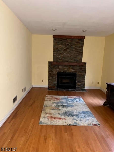 7 Rymon Road Washington, NJ 07882 - Photo 9 of 15 a view of empty room with wooden floor