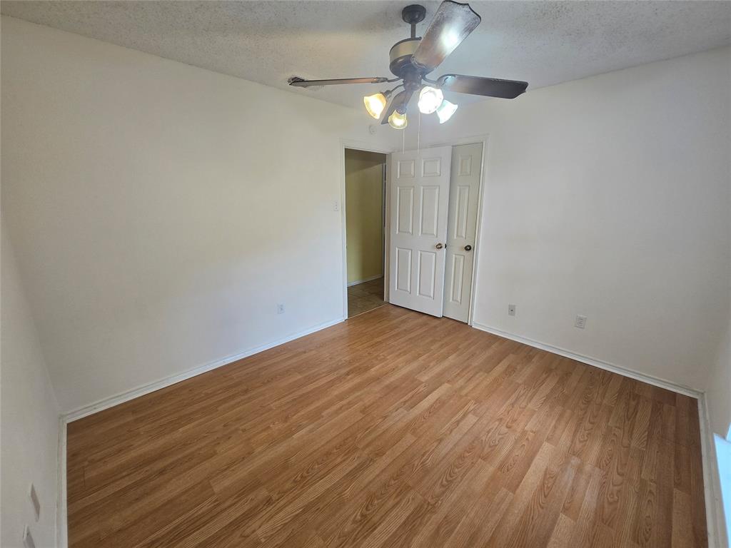 925 Shell Lane Lancaster, TX 75146 - Photo 8 of 10 wooden floor in an empty room