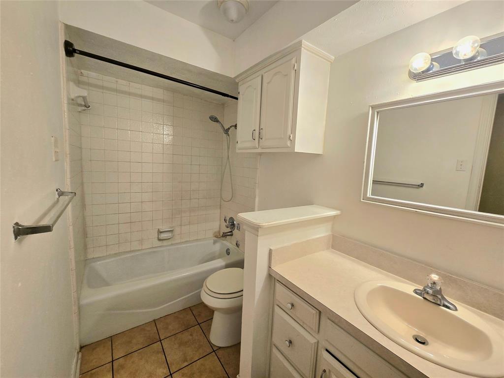 925 Shell Lane Lancaster, TX 75146 - Photo 10 of 10 a bathroom with a sink toilet and shower