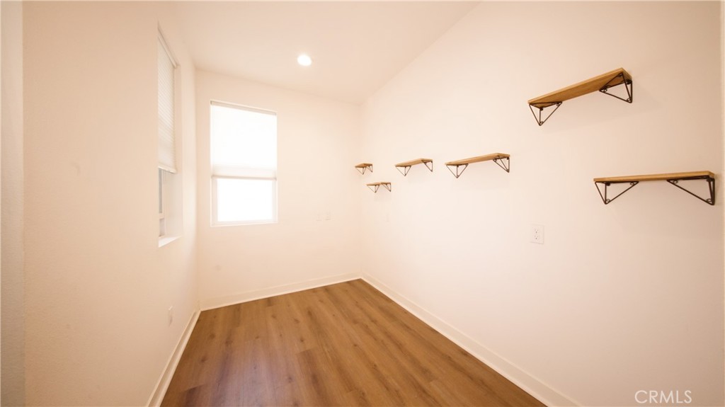 320 Bridgewater Way, Unit 7 Gardena, CA 90247 - Photo 22 of 41 a view of a room with wooden floor