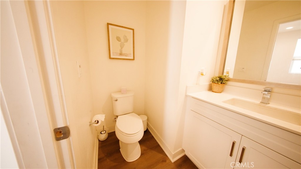 320 Bridgewater Way, Unit 7 Gardena, CA 90247 - Photo 25 of 41 a bathroom with a sink and a toilet