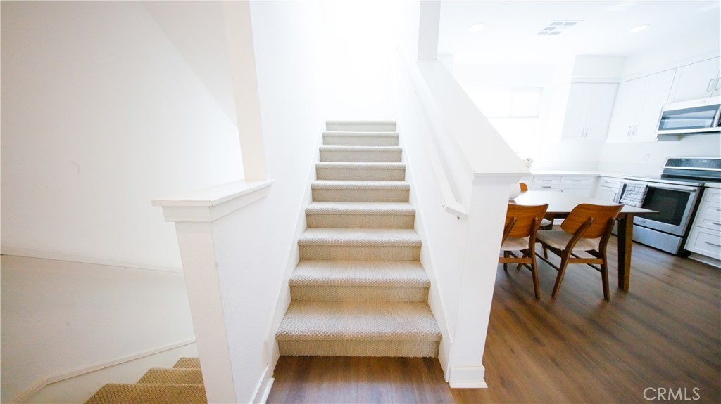 320 Bridgewater Way, Unit 7 Gardena, CA 90247 - Photo 26 of 41 a view of entryway and hall with wooden floor
