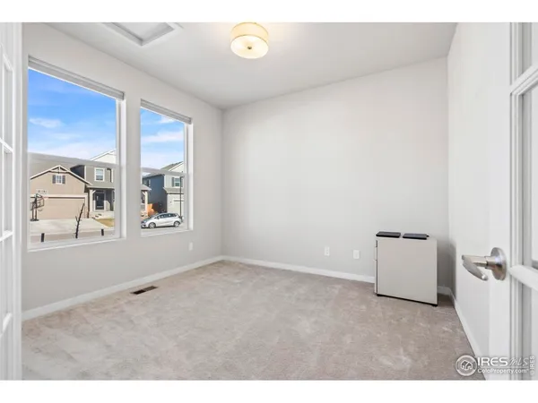 an empty room with windows