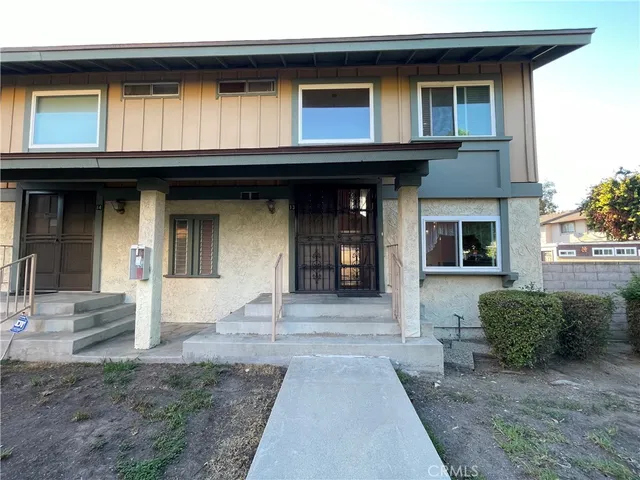 a front view of a house with entryway
