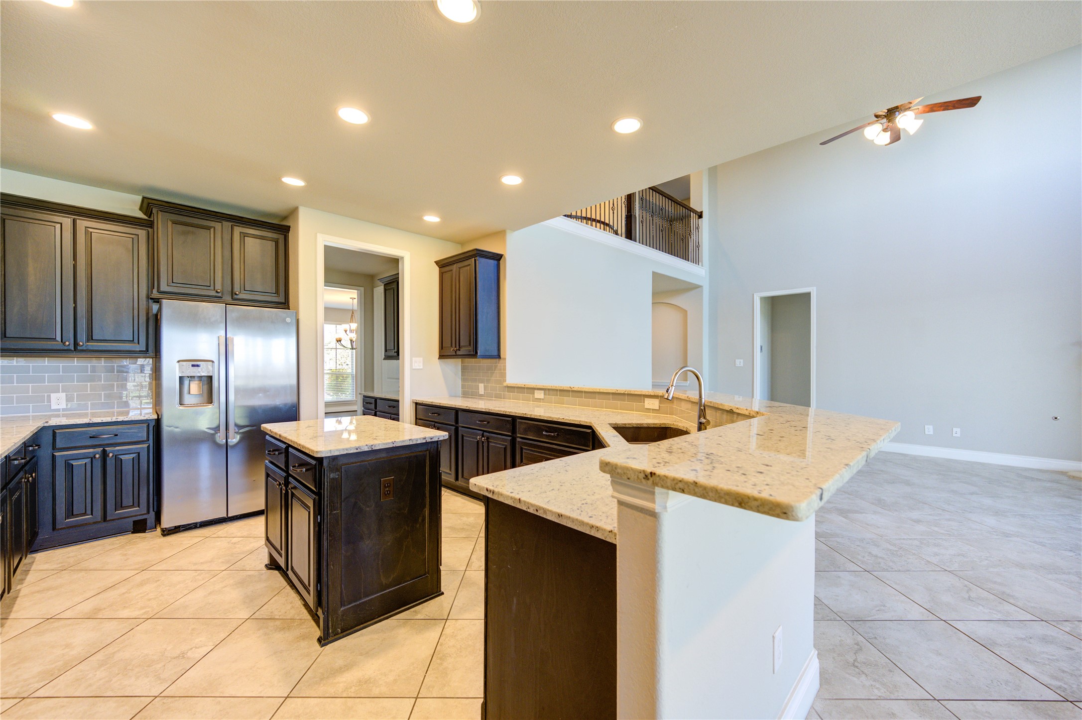 4207 Abigail Way Sugar Land, TX 77479 - Photo 15 of 48 a kitchen with a sink a counter top space stainless steel appliances and cabinets