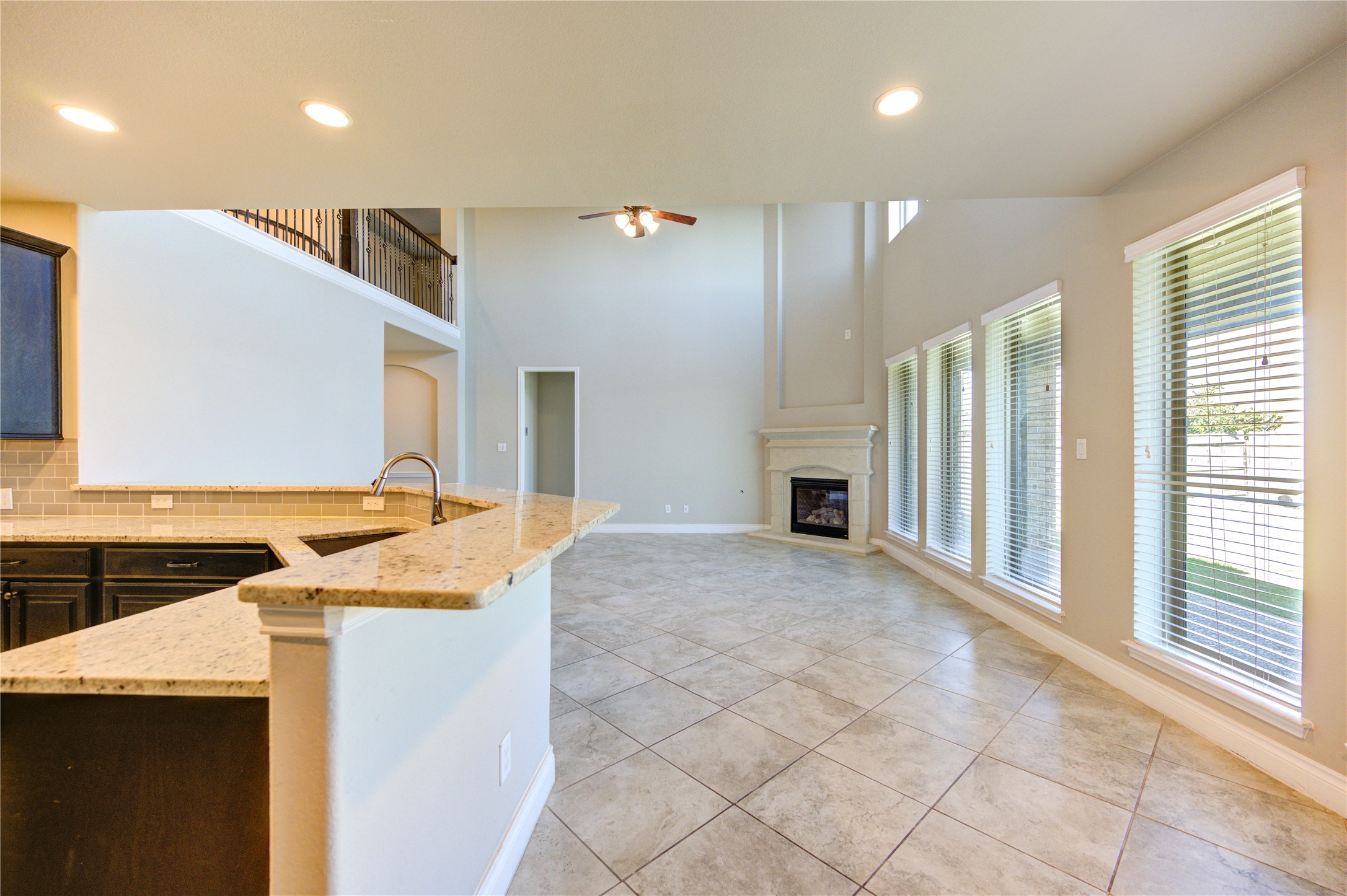 4207 Abigail Way Sugar Land, TX 77479 - Photo 22 of 48 a bathroom with a granite countertop sink a mirror and a shower