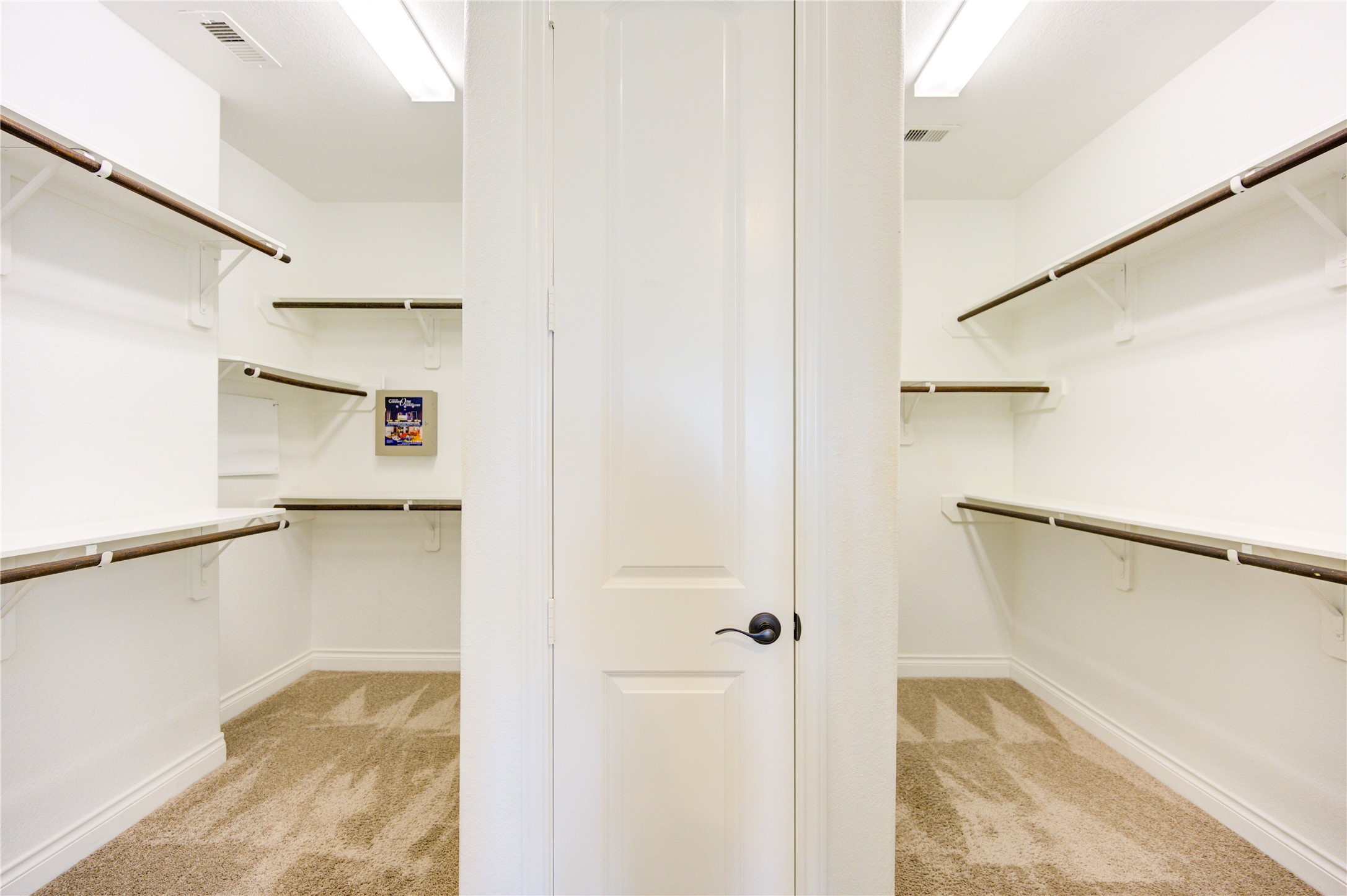 4207 Abigail Way Sugar Land, TX 77479 - Photo 29 of 48 a view of walk in closet with empty racks
