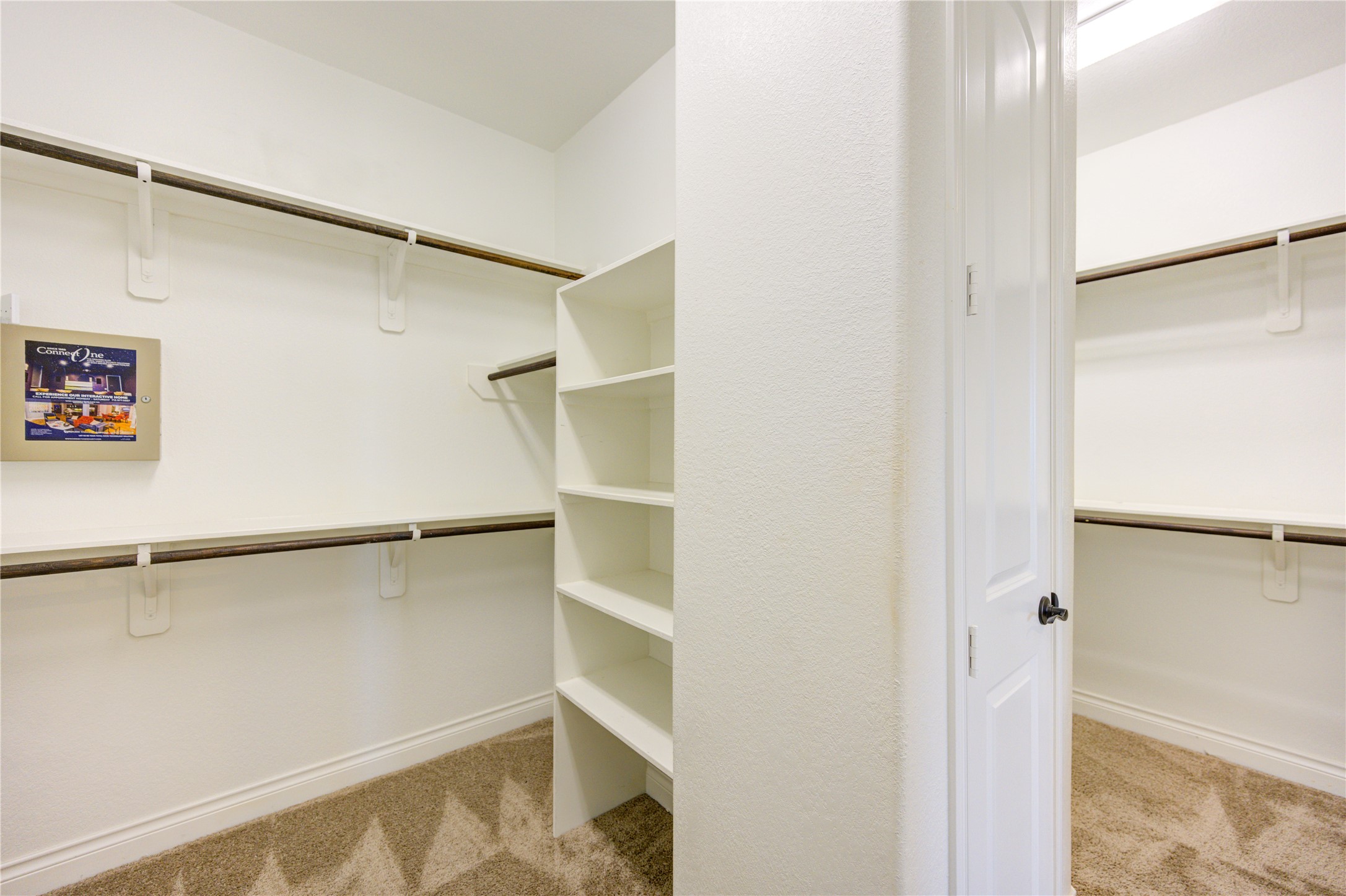4207 Abigail Way Sugar Land, TX 77479 - Photo 30 of 48 a view of walk in closet with empty racks