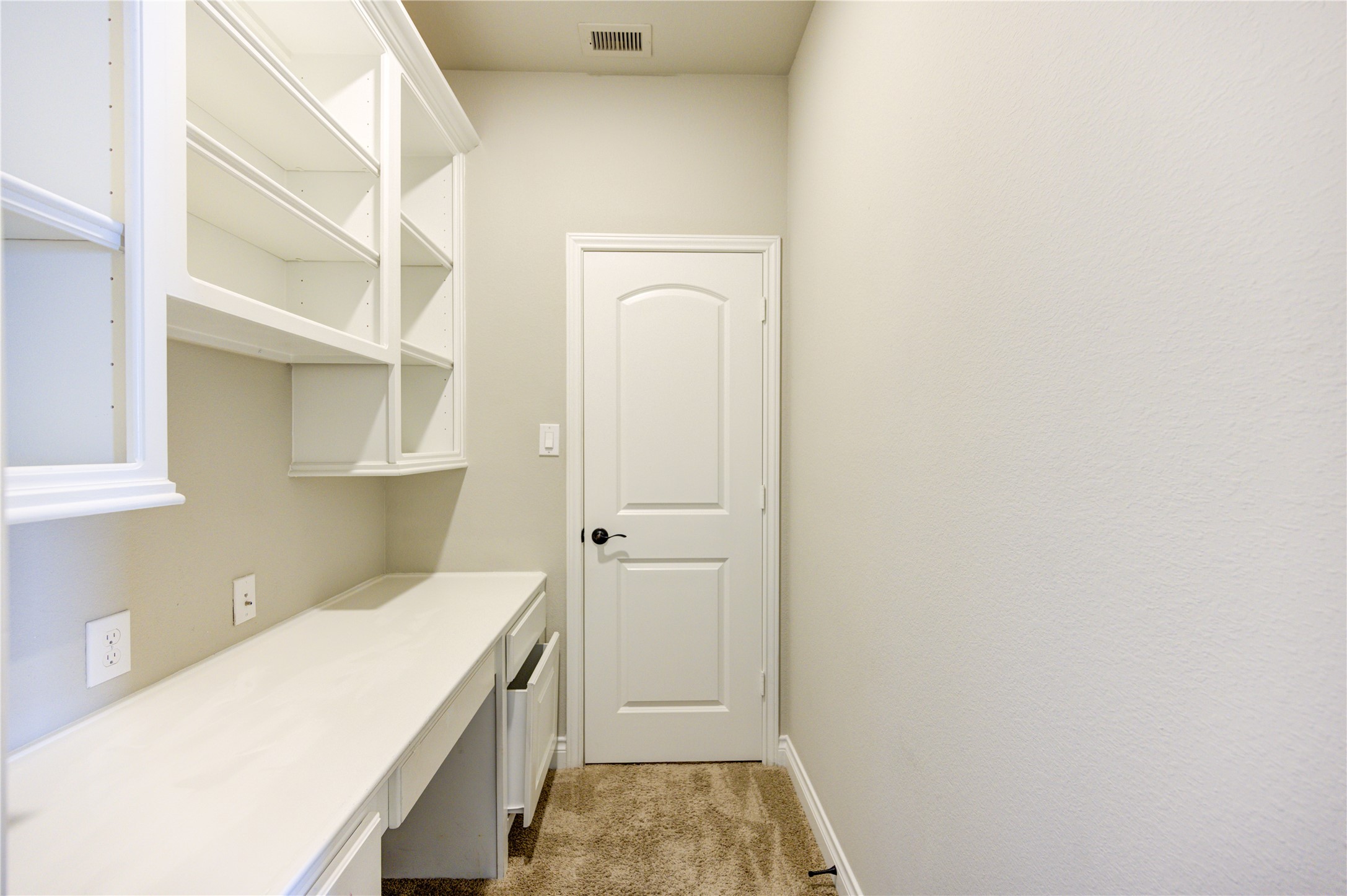 4207 Abigail Way Sugar Land, TX 77479 - Photo 44 of 48 a room with a cabinets and wooden floor