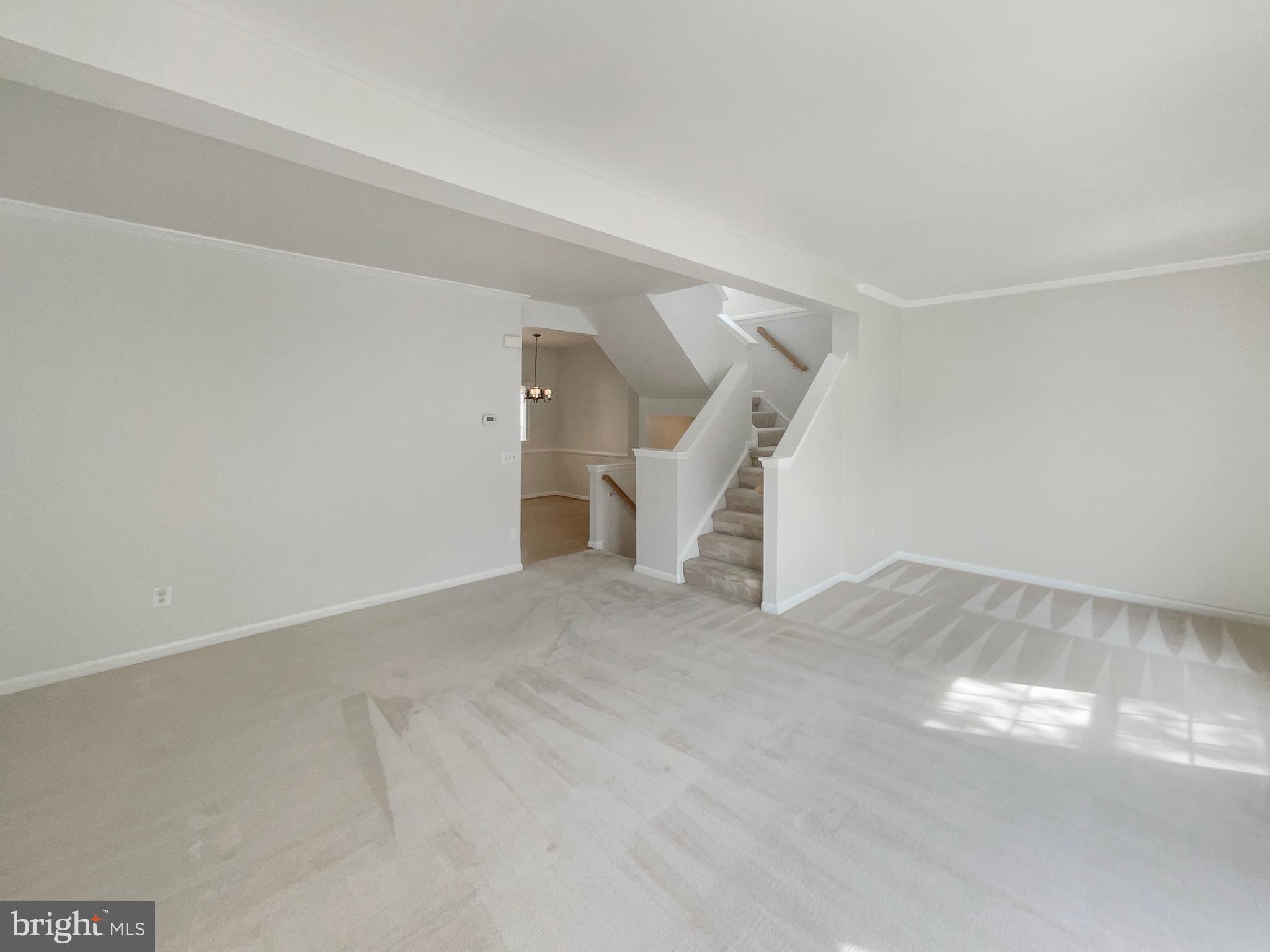 14272 Glade Spring Drive Centreville, VA 20121 - Photo 19 of 46 a view of an empty room with stairs