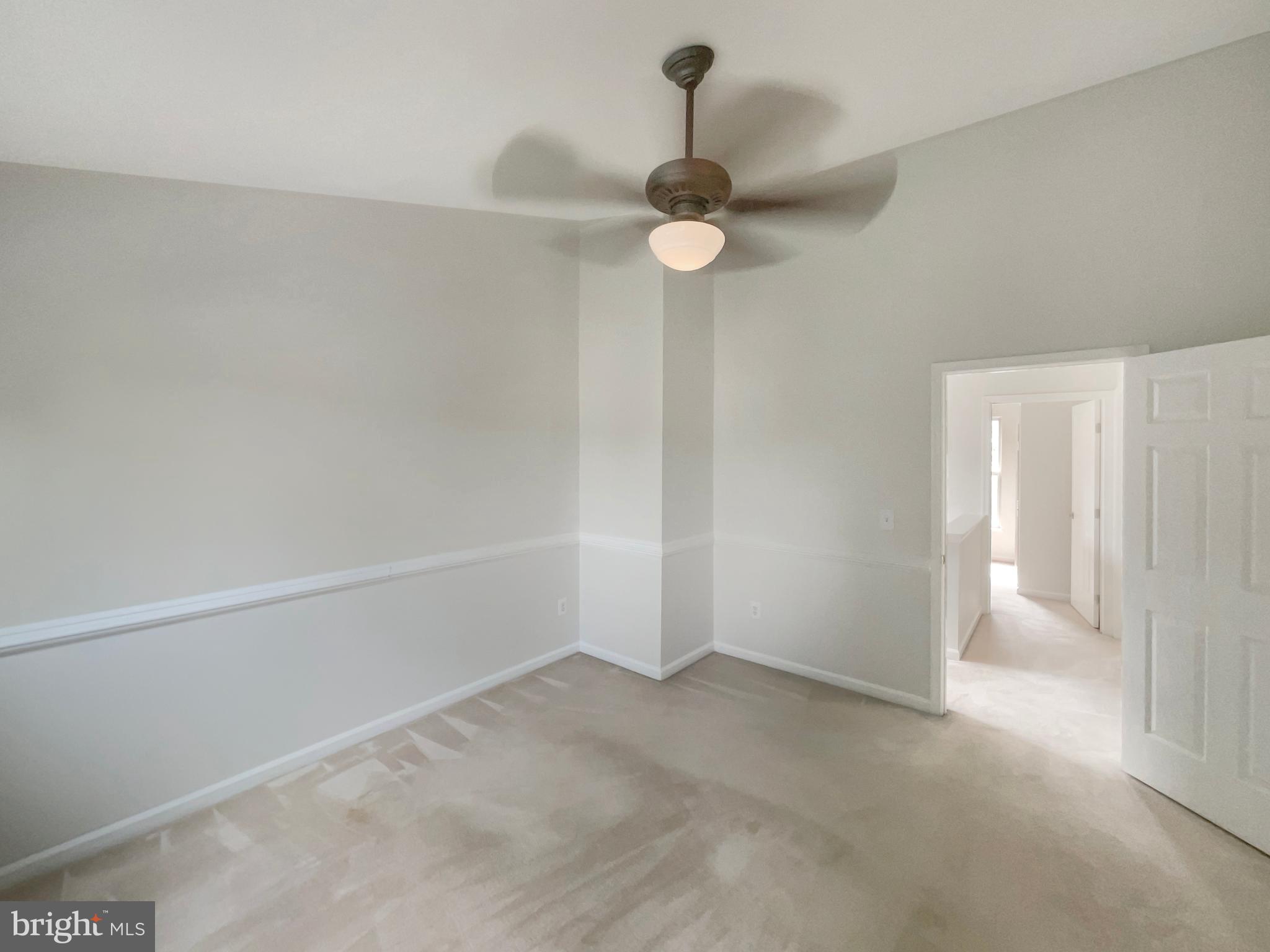 14272 Glade Spring Drive Centreville, VA 20121 - Photo 21 of 46 a view of an empty room with a fan