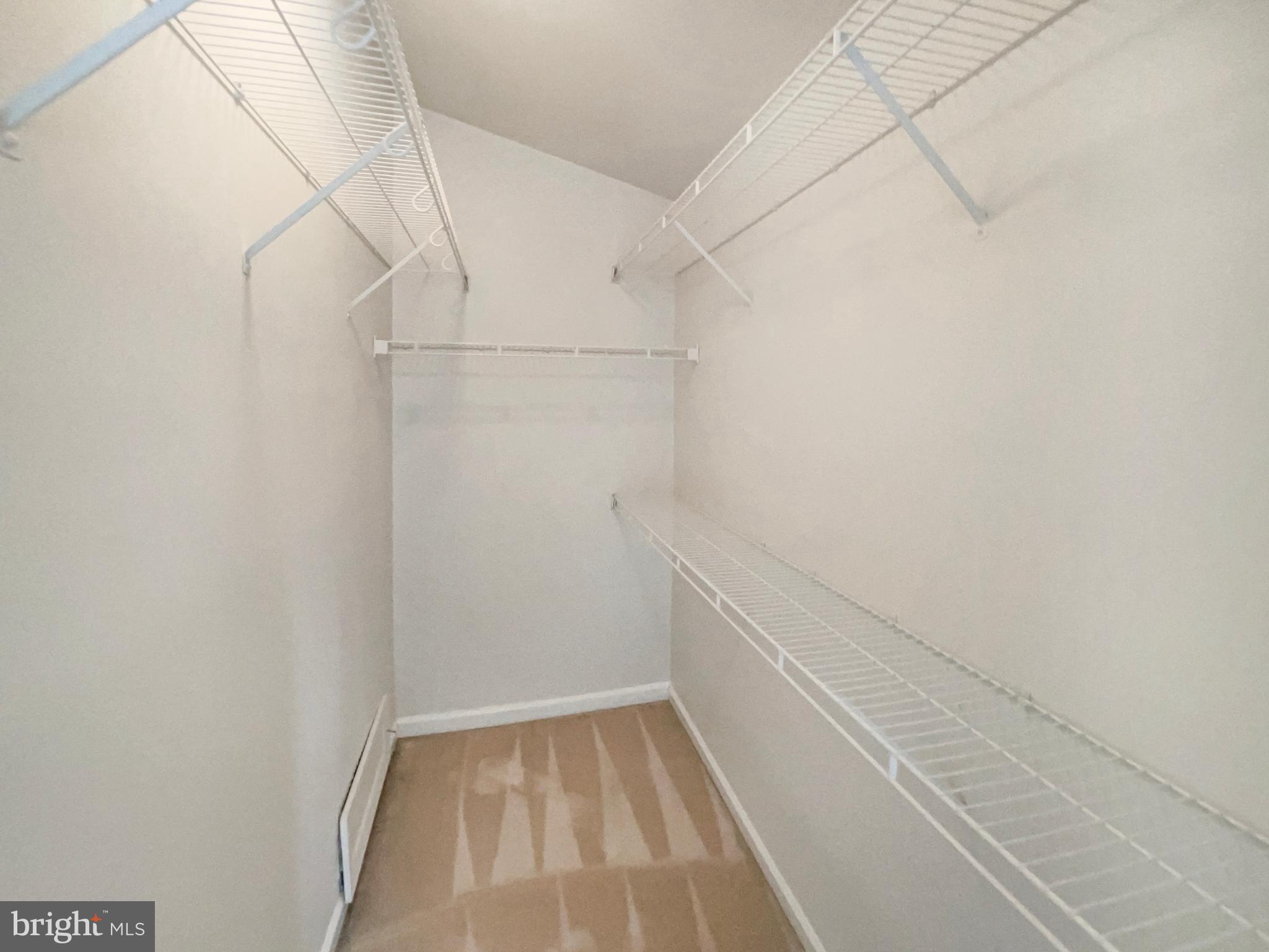 14272 Glade Spring Drive Centreville, VA 20121 - Photo 22 of 46 a view of a room with racks on the wall