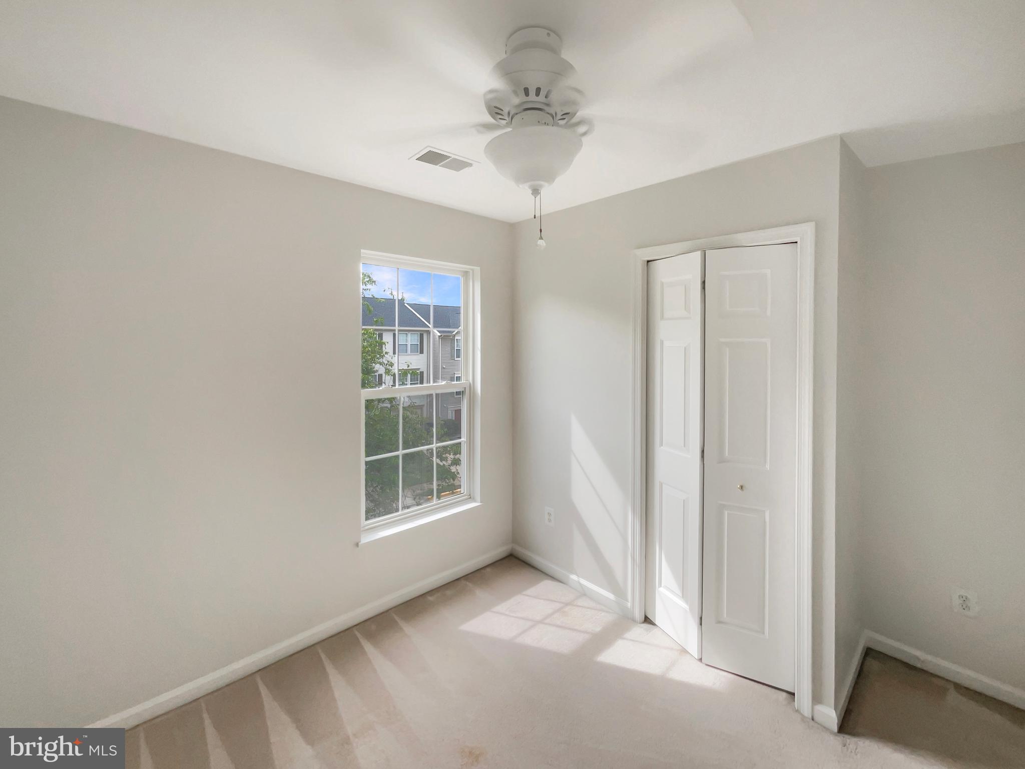 14272 Glade Spring Drive Centreville, VA 20121 - Photo 29 of 46 a view of an empty room with a window