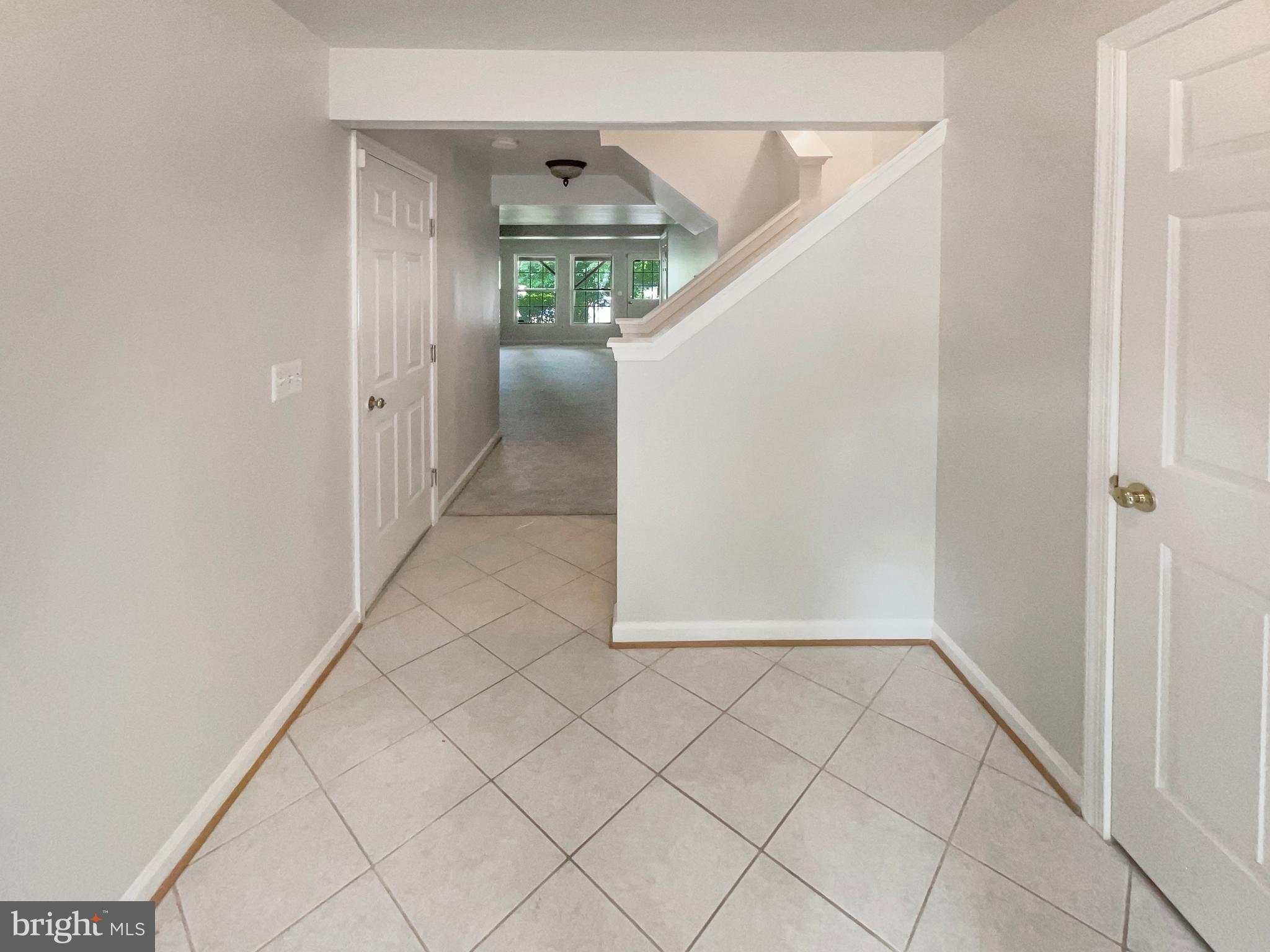 14272 Glade Spring Drive Centreville, VA 20121 - Photo 37 of 46 a view of entryway with wooden floor