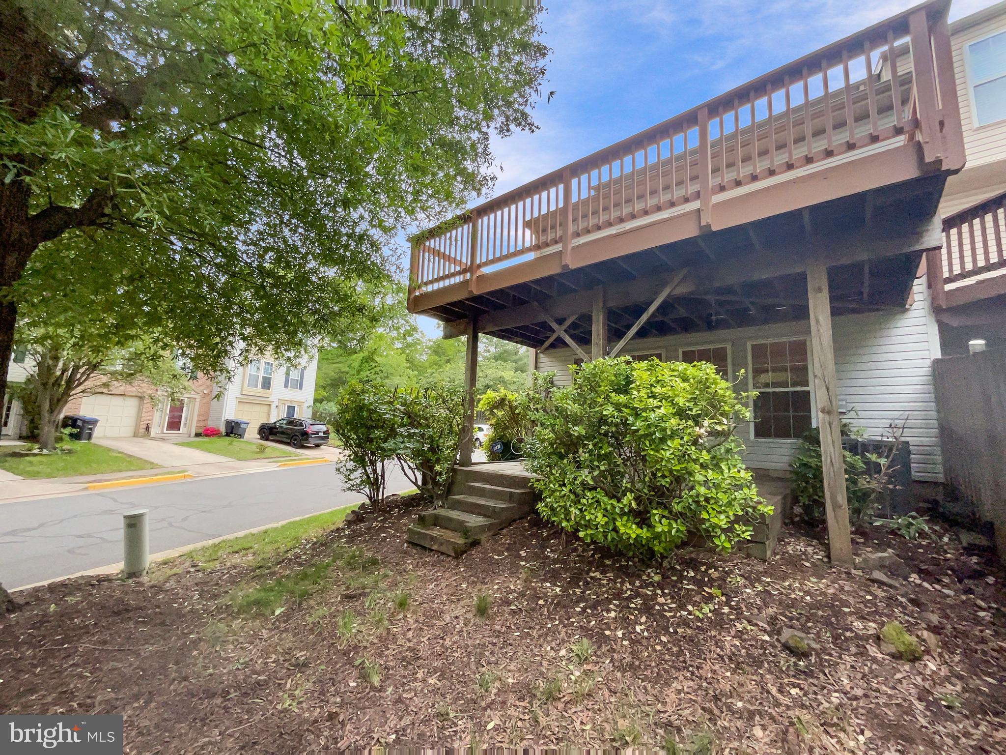 14272 Glade Spring Drive Centreville, VA 20121 - Photo 39 of 46 a view of a house with backyard and sitting area