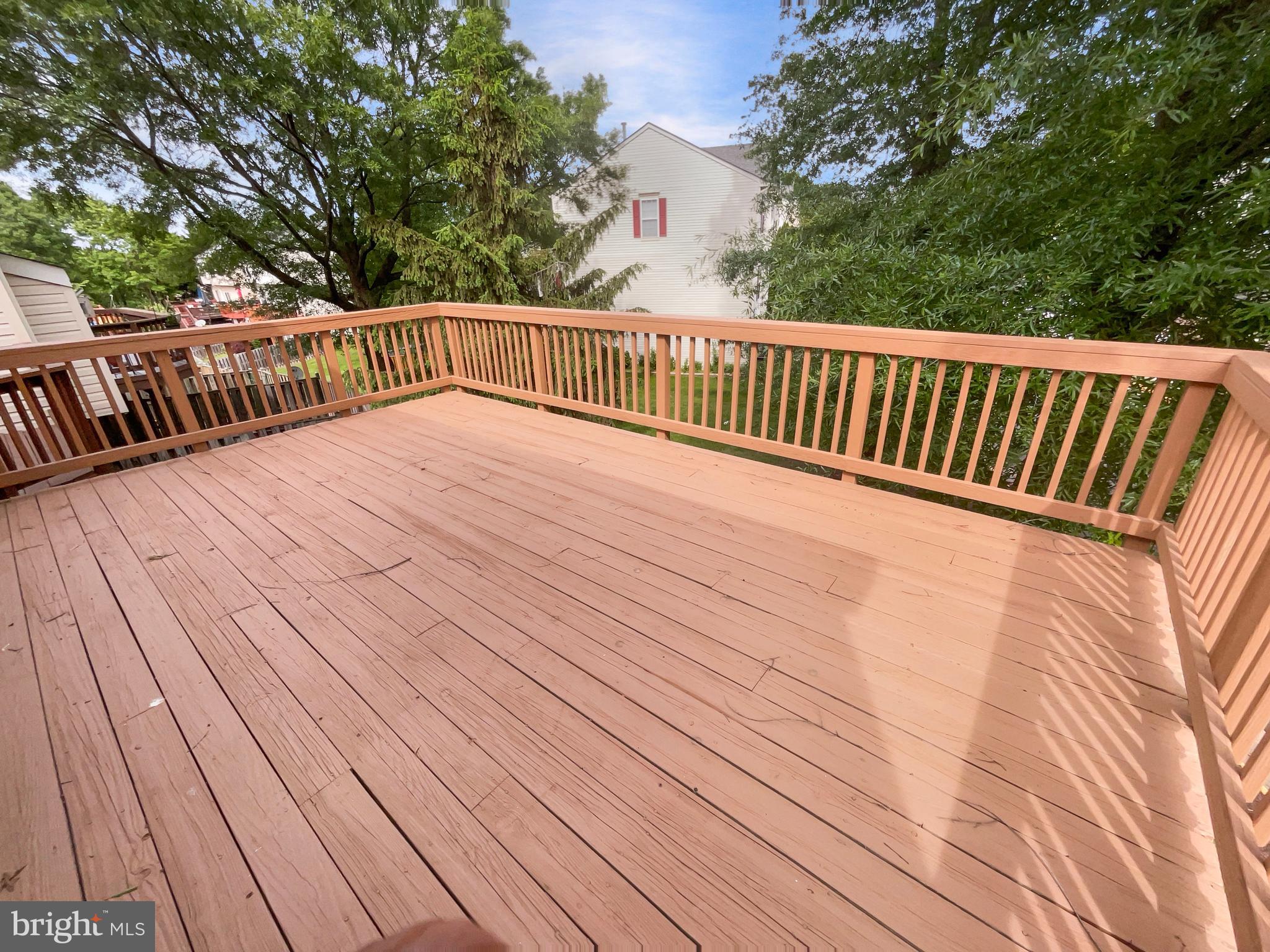 14272 Glade Spring Drive Centreville, VA 20121 - Photo 45 of 46 a view of deck with wooden floor and fence
