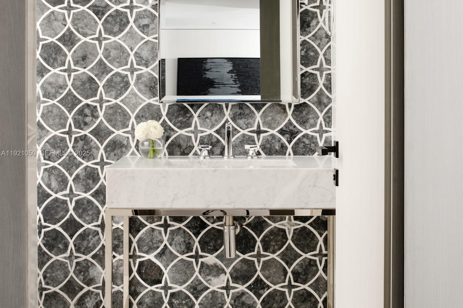 5875 Collins Avenue, Unit 902 Miami Beach, FL 33140 - Photo 21 of 34 Guest Bathroom