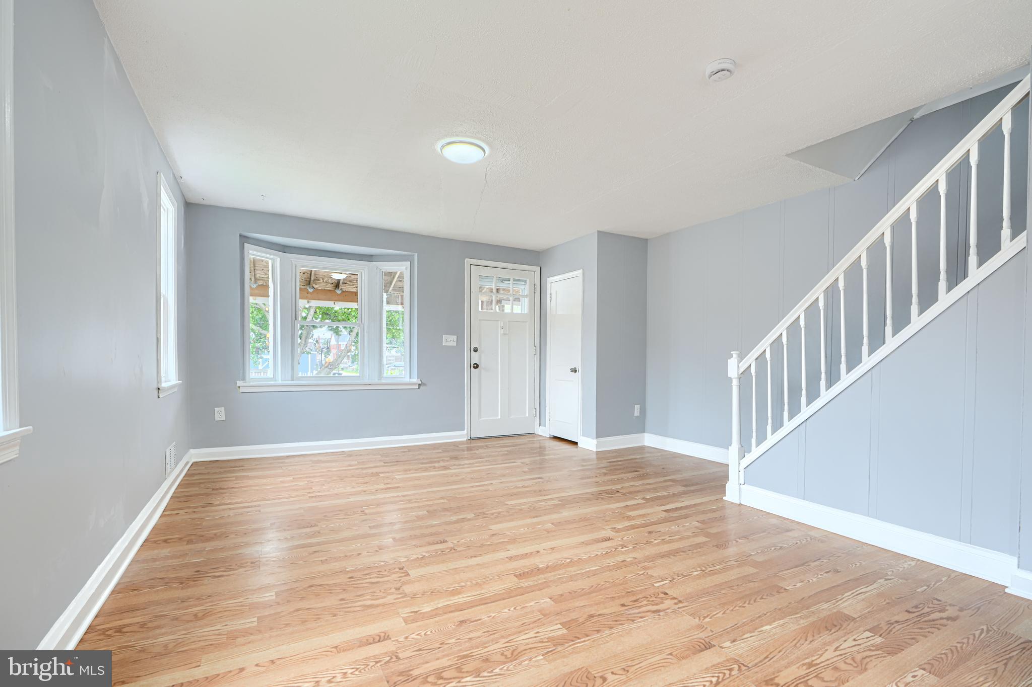 1902 Kelmore Road Baltimore, MD 21222 - Photo 4 of 27 LIVING ROOM w/ BAY WINDOW