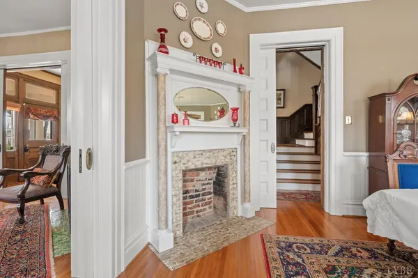 a bathroom with a toilet a sink and a mirror